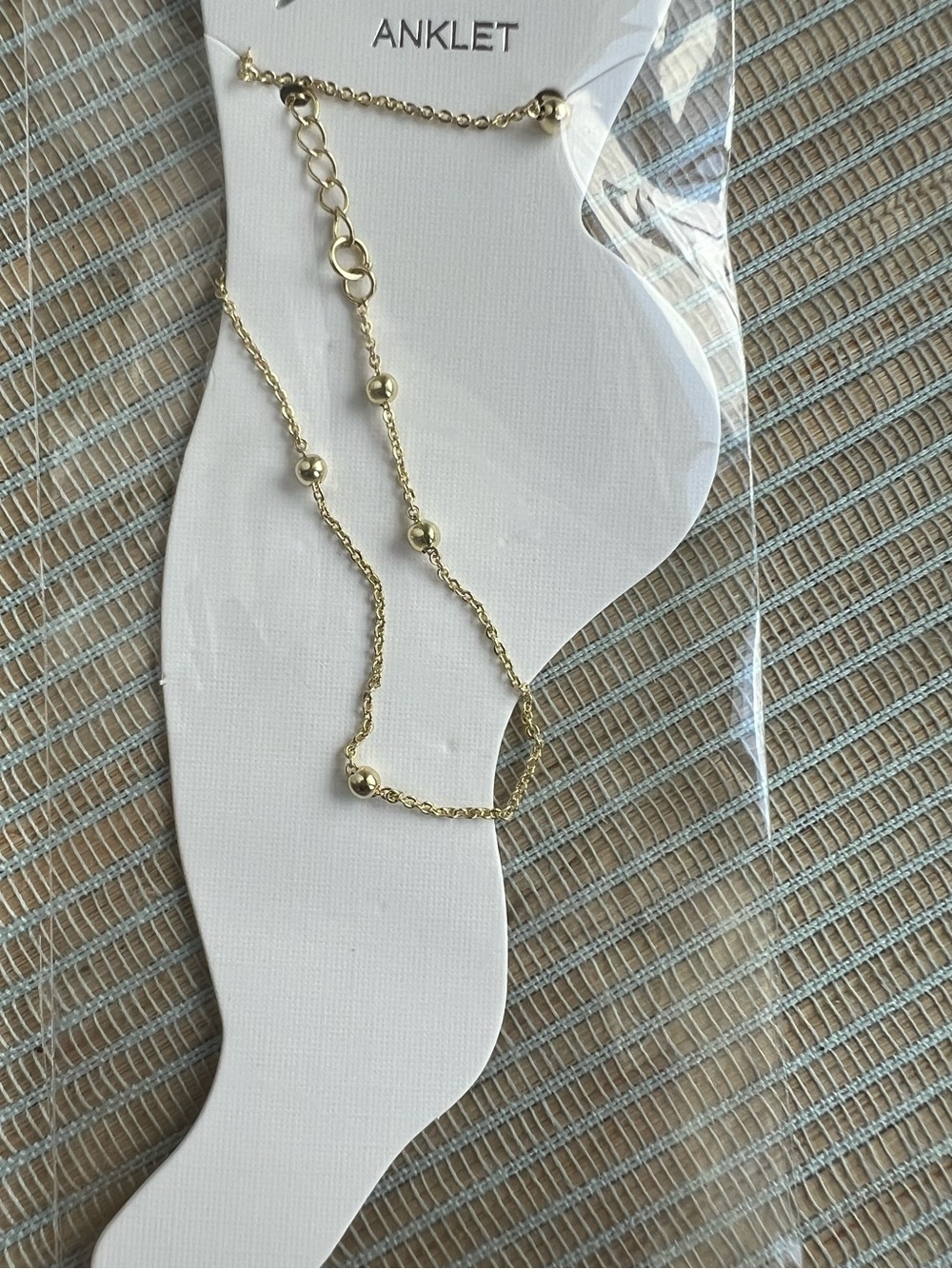 Gold chain anklet with medium sized round bead accents